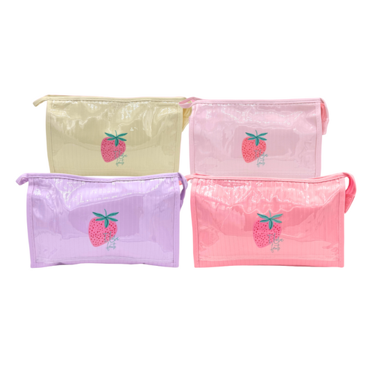 Four pastel-colored pouches with strawberry designs on a pink background